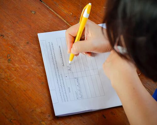 hand-pen-paper-white