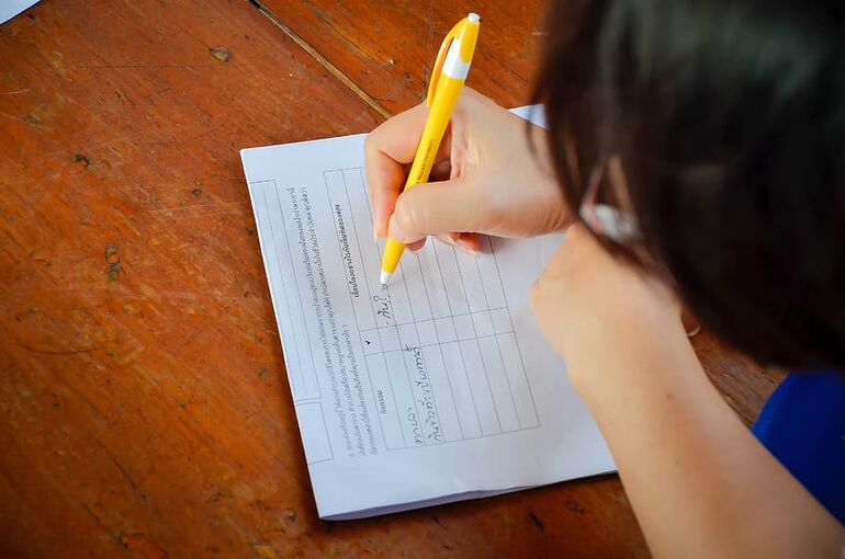 hand-pen-paper-white